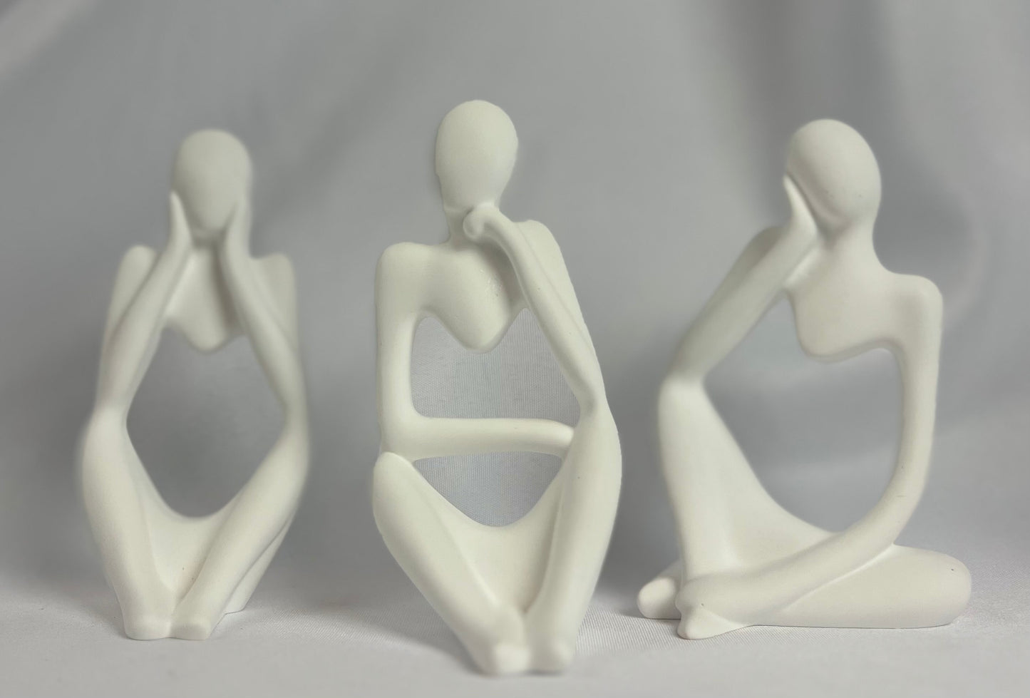 PONDERING SILHOUETTE CANDLES